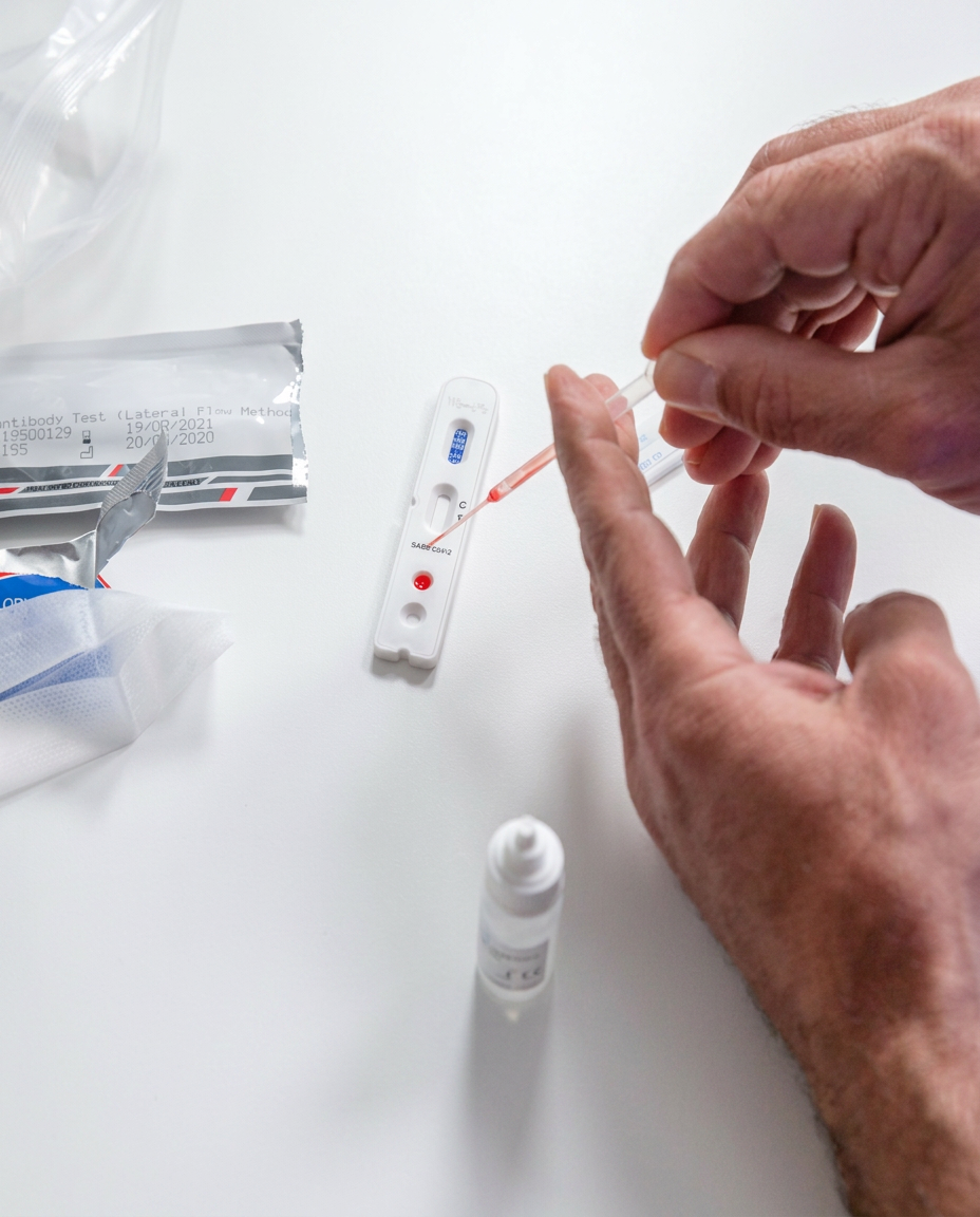 An at-home lab testing kit with collection tubes ready to ship